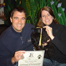 The Cordes' with their puppy, Bella, from Classicpoos.